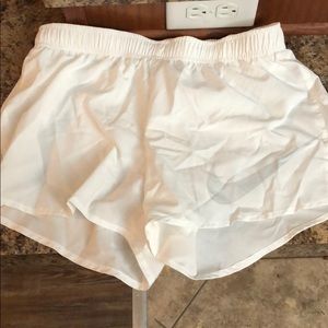 Brand New!! Nike DriFit women’s shorts. white.